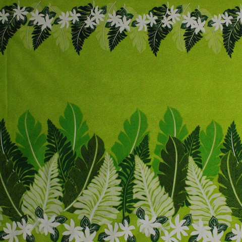 Green and white floral designs on green with white polka-dot background on 100% cotton