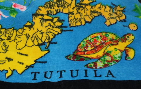 Tropical designs of the island of Tutuila and turtles on a blue 100% cotton hand towel