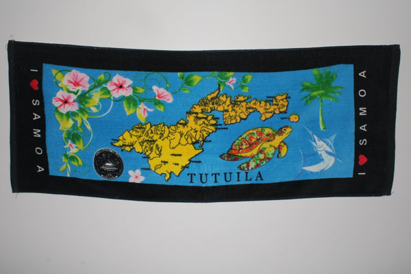 Tropical designs of the island of Tutuila and turtles on a blue 100% cotton hand towel