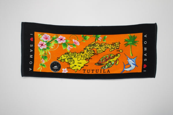 Tropical designs of the island of Tutuila and turtles on a orange 100% cotton hand towel
